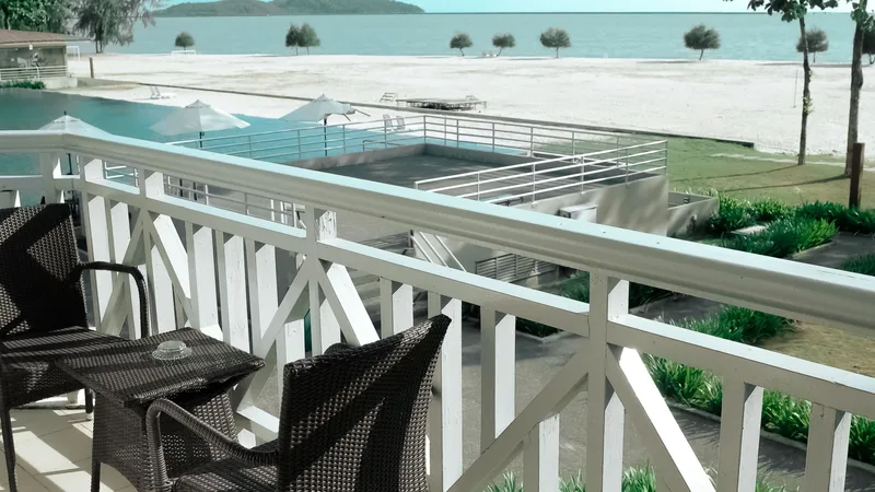 Deniz manzaralı balkon oturma alanı — temsili